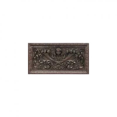 Pair of Italian Renaissance style carved walnut wall plaques with cupid head