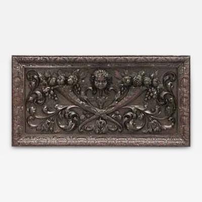 Pair of Italian Renaissance style carved walnut wall plaques with cupid head