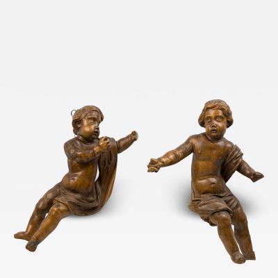 Pair of Italian Rococo Fruitwood Putti Figures