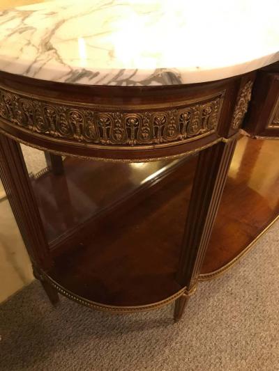 Pair of Jansen Style Marble Top Bronze Mounted Consoles