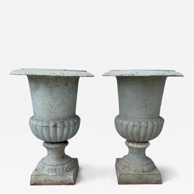 Pair of Late 19th Century Medici Cast Iron Urns in a Distressed Grey Patina