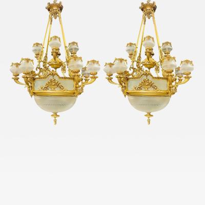 Pair of Louis XVI Style Bronze Chandeliers