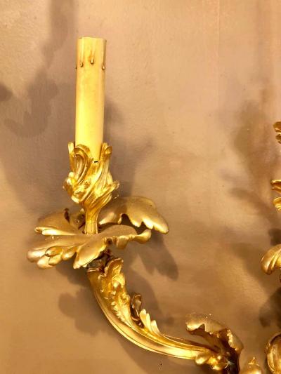 Pair of Louis XVI Style Bronze Three Light Gilt Bronze Sconces