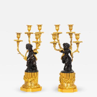 Pair of Louis XVI Style Four Light Candelabra after Clodion