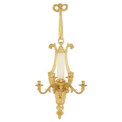 Pair of Louis XVI style gilt bronze sconces