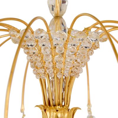 Pair of Louis XVI style ormolu malachite and rock crystal girandoles