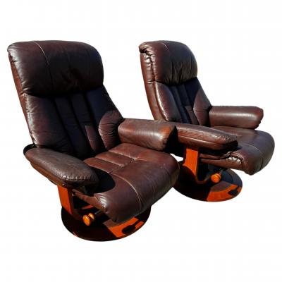 Pair of MCM Swedish Brown Leather Swivel Lounge Chairs w Ottomans