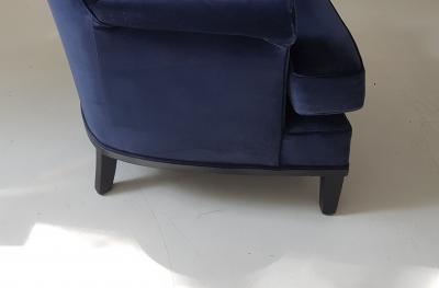 Pair of Mid Cdntury Modern armchairs with black lacquered legs 