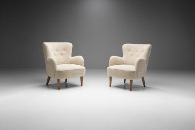 Pair of Mid Century Armchairs by a Swedish Cabinetmaker Sweden ca 1950s