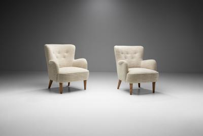 Pair of Mid Century Armchairs by a Swedish Cabinetmaker Sweden ca 1950s