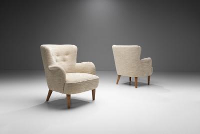 Pair of Mid Century Armchairs by a Swedish Cabinetmaker Sweden ca 1950s