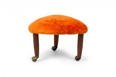 Pair of Mid Century Italian Modern Triangular Orange Upholstered Footstools man