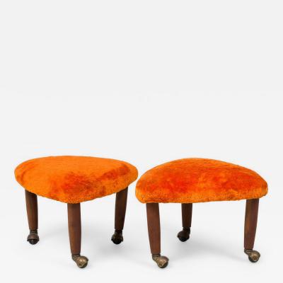 Pair of Mid Century Italian Modern Triangular Orange Upholstered Footstools man