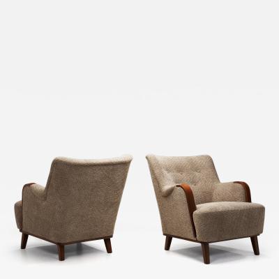 Pair of Mid Century Modern Armchairs with Wooden Arm Details Europe 1950s
