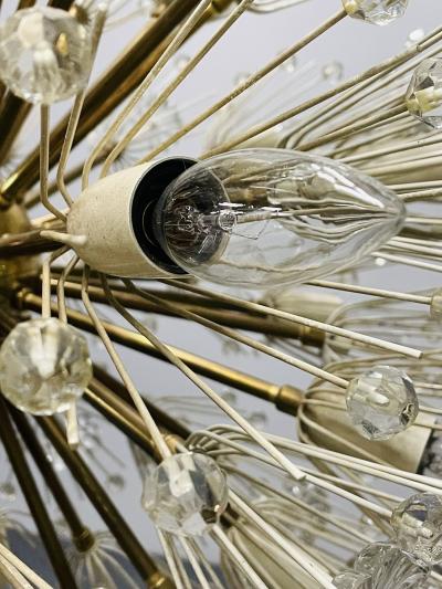 Pair of Mid Century Modern Austrian Circular Chandeliers Brass and Glass 1960s