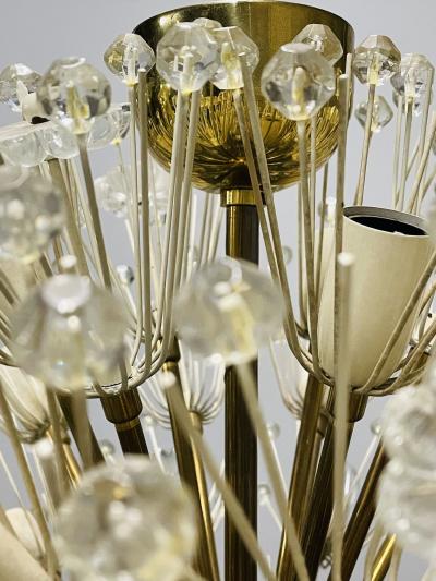 Pair of Mid Century Modern Austrian Circular Chandeliers Brass and Glass 1960s