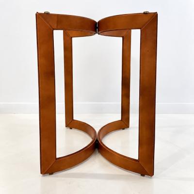 Pair of Mid Century Modern side tables in the style of Jacques Adnet 