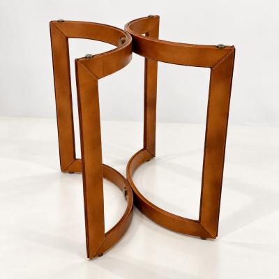 Pair of Mid Century Modern side tables in the style of Jacques Adnet 