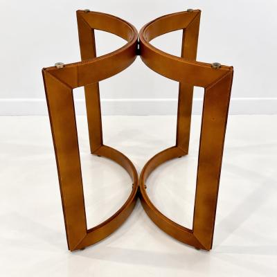 Pair of Mid Century Modern side tables in the style of Jacques Adnet 