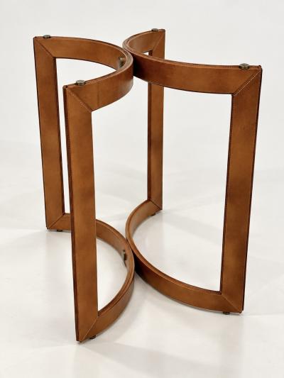 Pair of Mid Century Modern side tables in the style of Jacques Adnet 