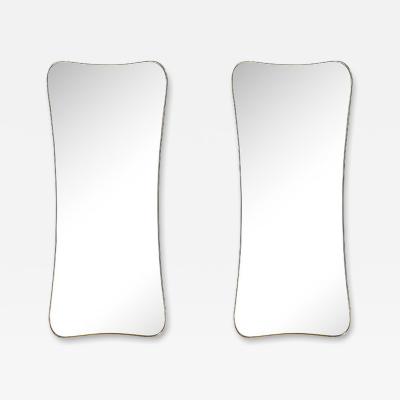 Pair of Mid Century Modernist Curvilinear Hourglass Form Brass Wrapped Mirrors
