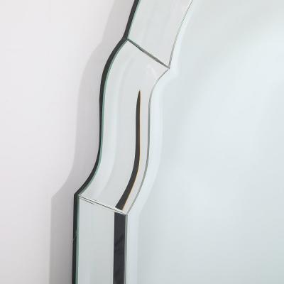 Pair of Mid Century Modernist Serifed Arch Form Mirrors with Beveled Detailing
