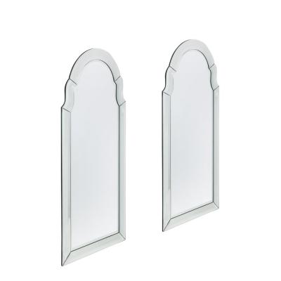 Pair of Mid Century Modernist Serifed Arch Form Mirrors with Beveled Detailing
