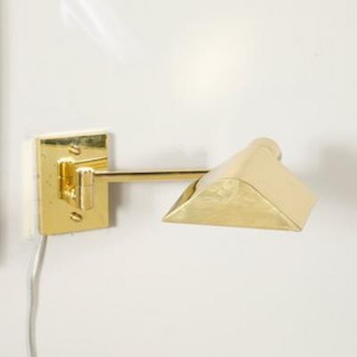 Pair of Mid Century Modernist Swing Arm Articulating Sconces in Polished Brass
