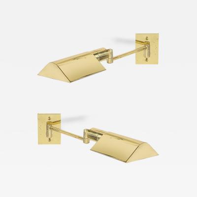 Pair of Mid Century Modernist Swing Arm Articulating Sconces in Polished Brass