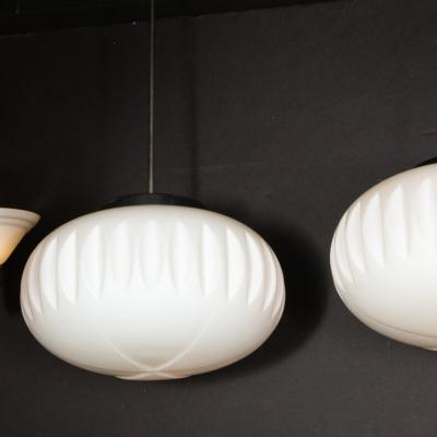 Pair of Mid Century White Frosted Oval Chandeliers with Black Enamel Chrome Rods