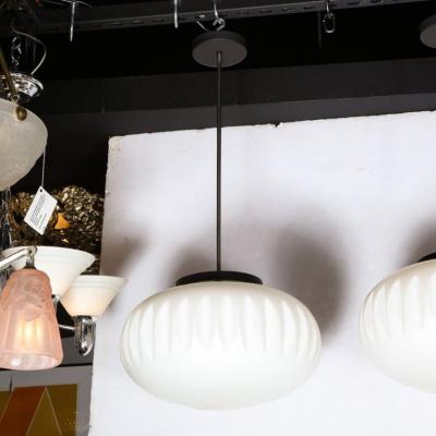 Pair of Mid Century White Frosted Oval Chandeliers with Black Enamel Chrome Rods