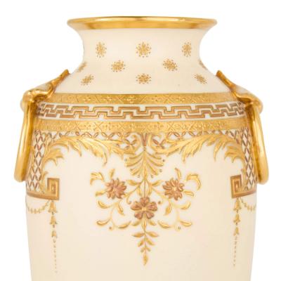 Pair of Minton Gilt Decorated Ivory Ground Porcelain Vases