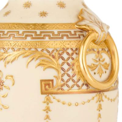 Pair of Minton Gilt Decorated Ivory Ground Porcelain Vases