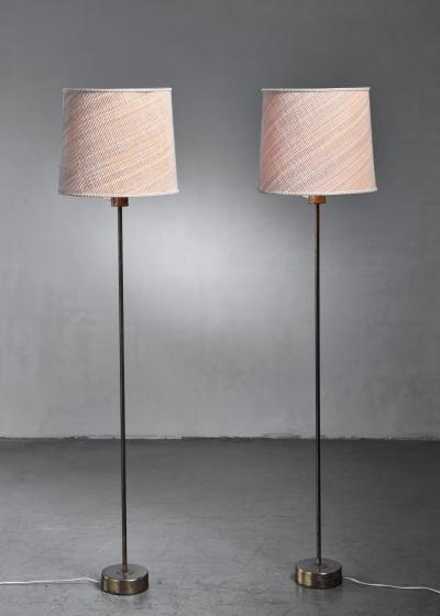Pair of Modern brass floor lamps