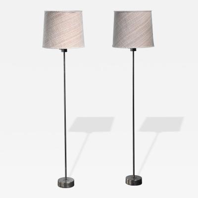 Pair of Modern brass floor lamps