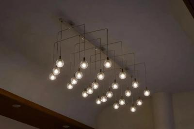 Pair of Monumental Mid Century Chandeliers in Glass Metal and Patinated Brass