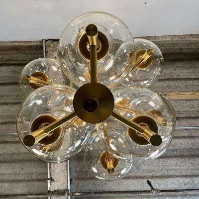 Pair of Monumental Mid Century Modern Style Chandeliers in Amber Glass and Brass
