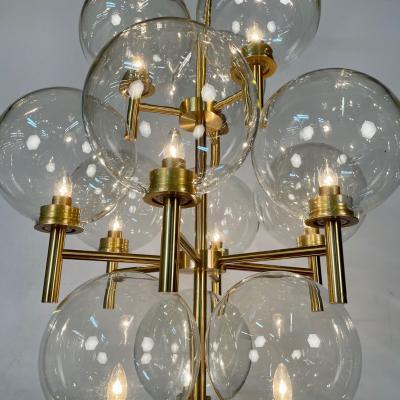 Pair of Monumental Mid Century Modern Style Chandeliers in Amber Glass and Brass