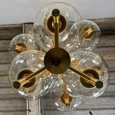 Pair of Monumental Mid Century Modern Style Chandeliers in Amber Glass and Brass