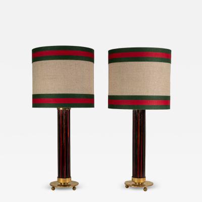Pair of Murano glass rods on brass metal table lamps