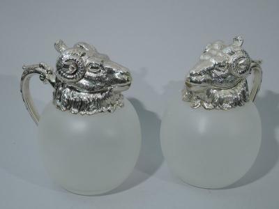 Pair of Neoclassical Camphor Glass Decanters with Rams Heads
