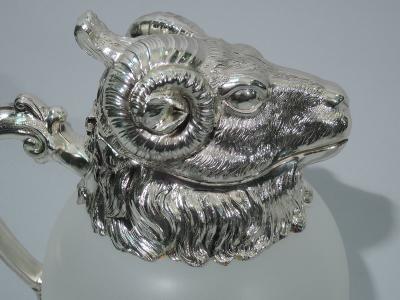 Pair of Neoclassical Camphor Glass Decanters with Rams Heads