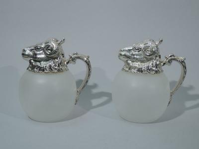 Pair of Neoclassical Camphor Glass Decanters with Rams Heads