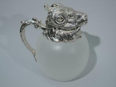 Pair of Neoclassical Camphor Glass Decanters with Rams Heads