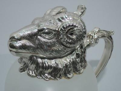 Pair of Neoclassical Camphor Glass Decanters with Rams Heads