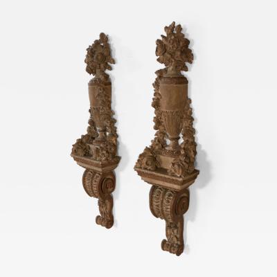 Pair of Neoclassical Carved and Painted Urns on Brackets