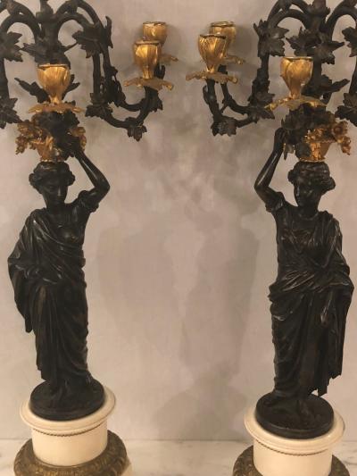Pair of Neoclassical Style Bronze Six Arm Figural Candelabra