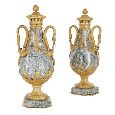 Pair of Neoclassical style gilt bronze and marble vases
