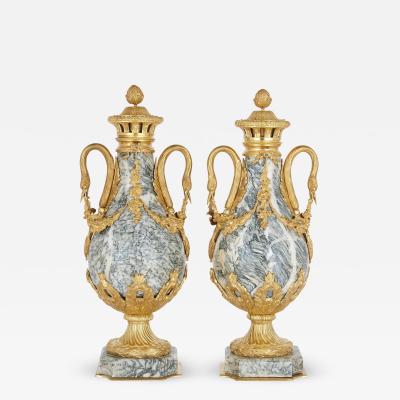 Pair of Neoclassical style gilt bronze and marble vases
