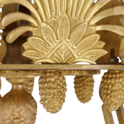 Pair of Neoclassical style gilt bronze chandeliers